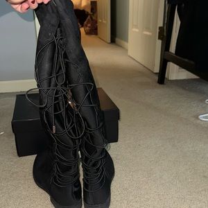 Black over the knee boots with laces in back